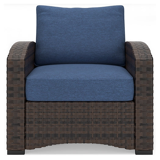 Ashley Express - Windglow Outdoor Loveseat and 2 Chairs with Coffee Table