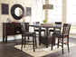 Haddigan Counter Height Dining Table and 4 Barstools with Storage